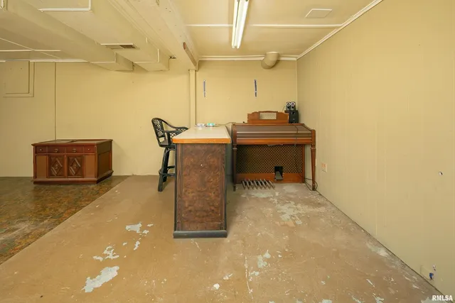 a room with a table and a chair