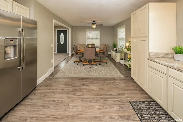 a view of a kitchen from the hallway