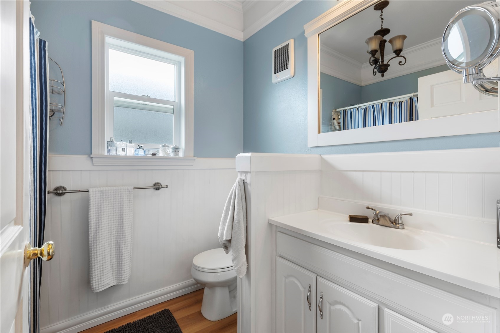 2812 19th Street Everett, WA 98201 - Photo 13 of 27 a bathroom with a sink a toilet and a window