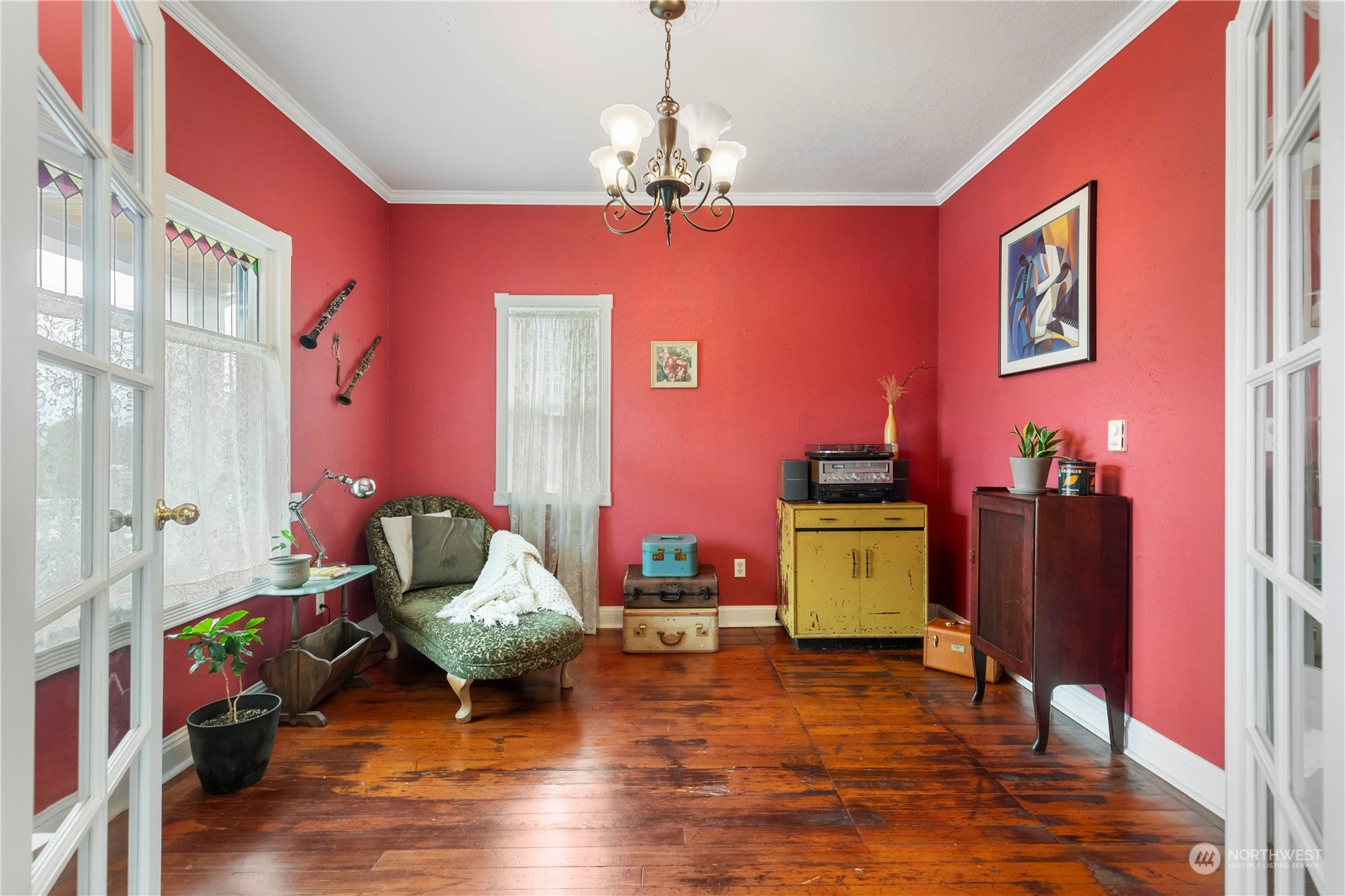 2812 19th Street Everett, WA 98201 - Photo 5 of 27 a living room with furniture and a chandelier