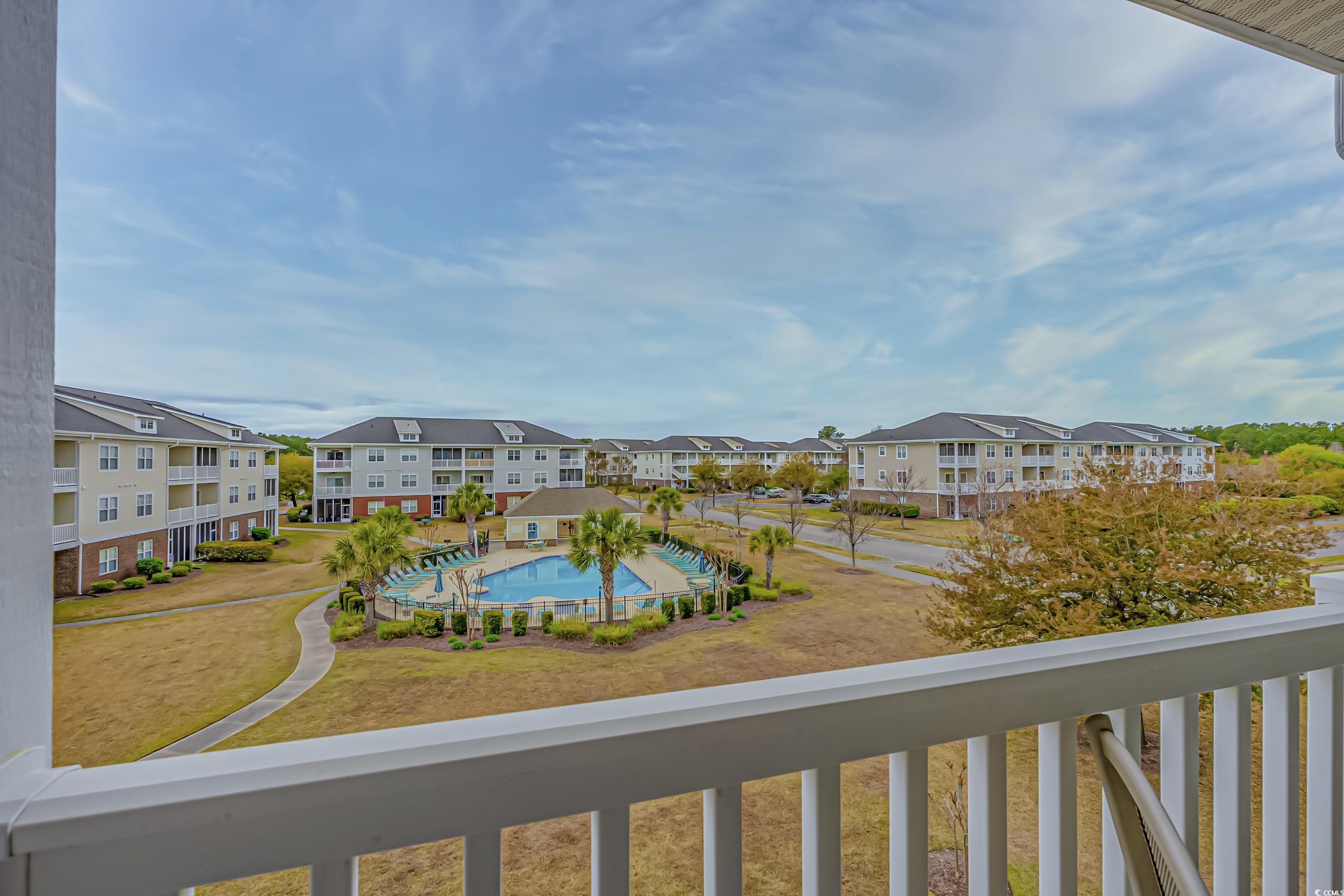 500 Wickham Drive, Unit HEATHERSTONE BUILDING 12 Myrtle Beach, SC 29579 - Photo 20 of 32 Balcony with view of pool