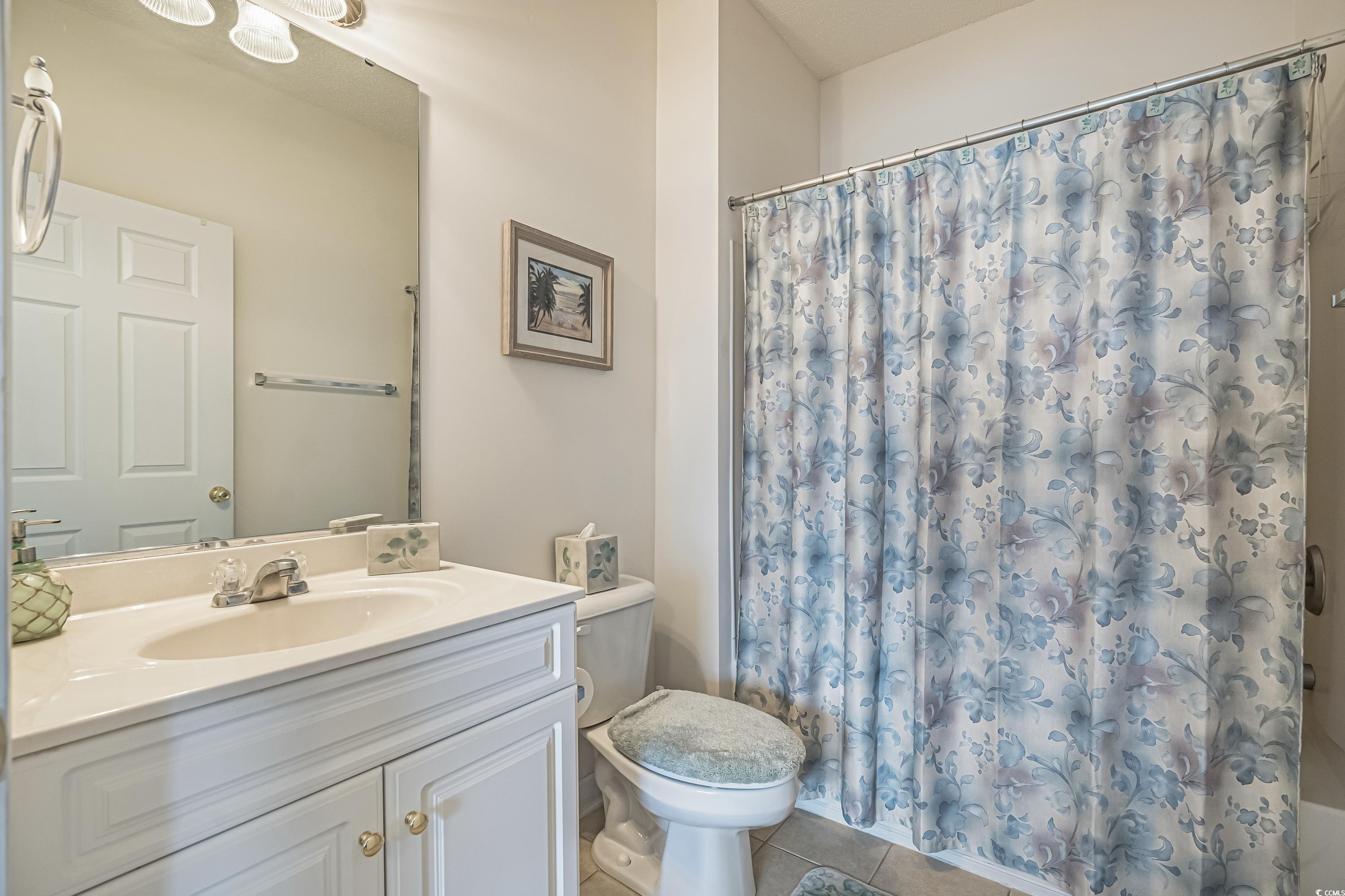 500 Wickham Drive, Unit HEATHERSTONE BUILDING 12 Myrtle Beach, SC 29579 - Photo 24 of 32 Bathroom featuring tile patterned flooring and vanity