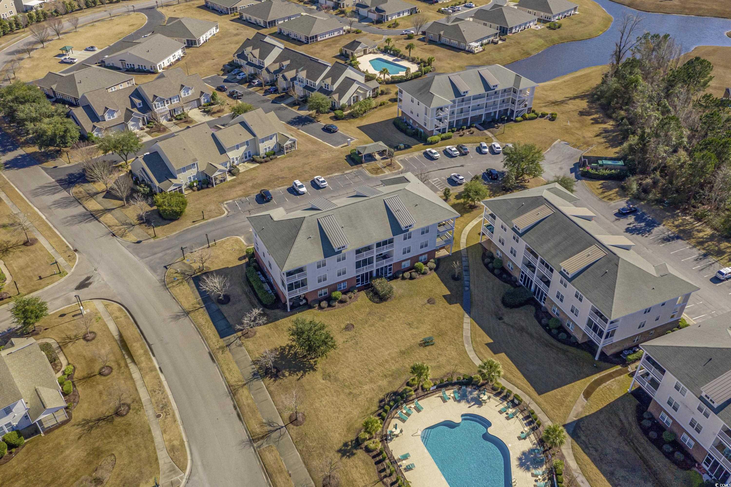 500 Wickham Drive, Unit HEATHERSTONE BUILDING 12 Myrtle Beach, SC 29579 - Photo 31 of 32 Aerial view of property's location featuring a nearby body of water and nearby suburban area