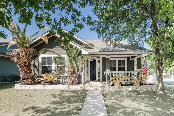 a view of a house with a patio