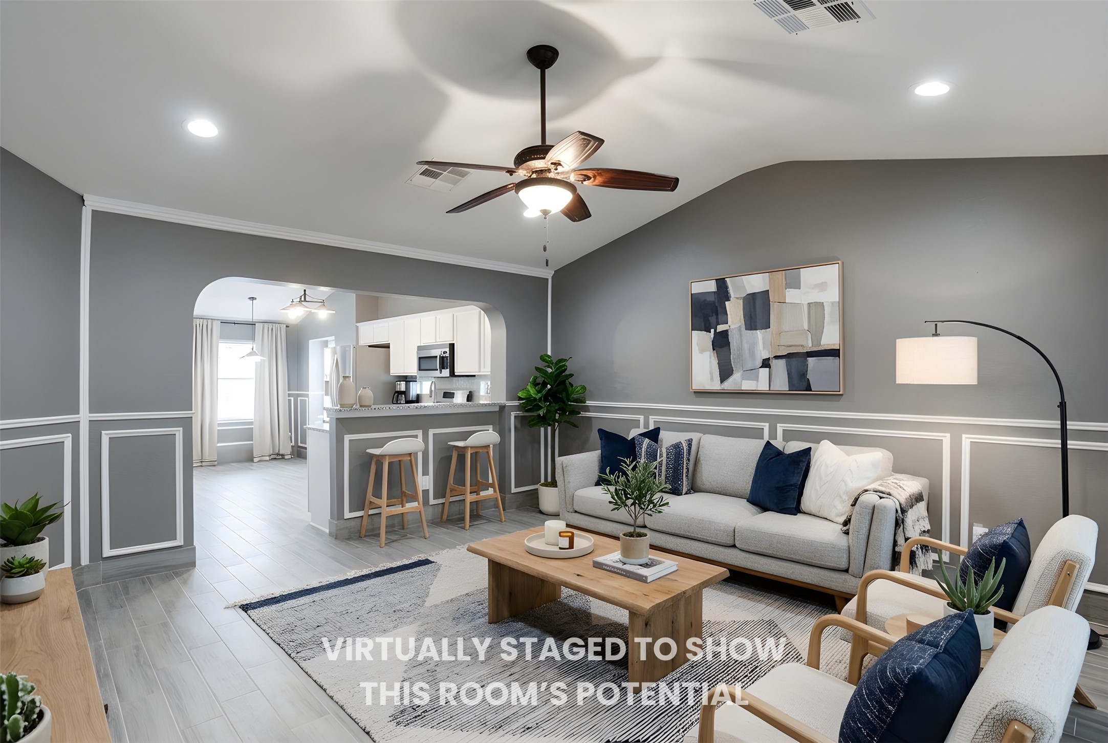 692 Scheel Kyle, TX 78640 - Photo 11 of 40 a living room with furniture and a chandelier