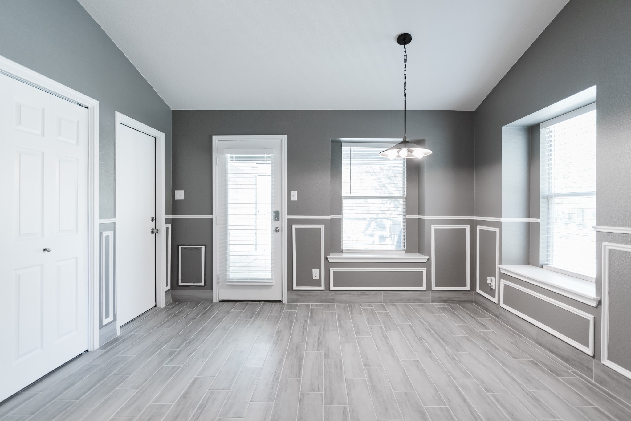 692 Scheel Kyle, TX 78640 - Photo 22 of 40 a view of empty room with wooden floor and window