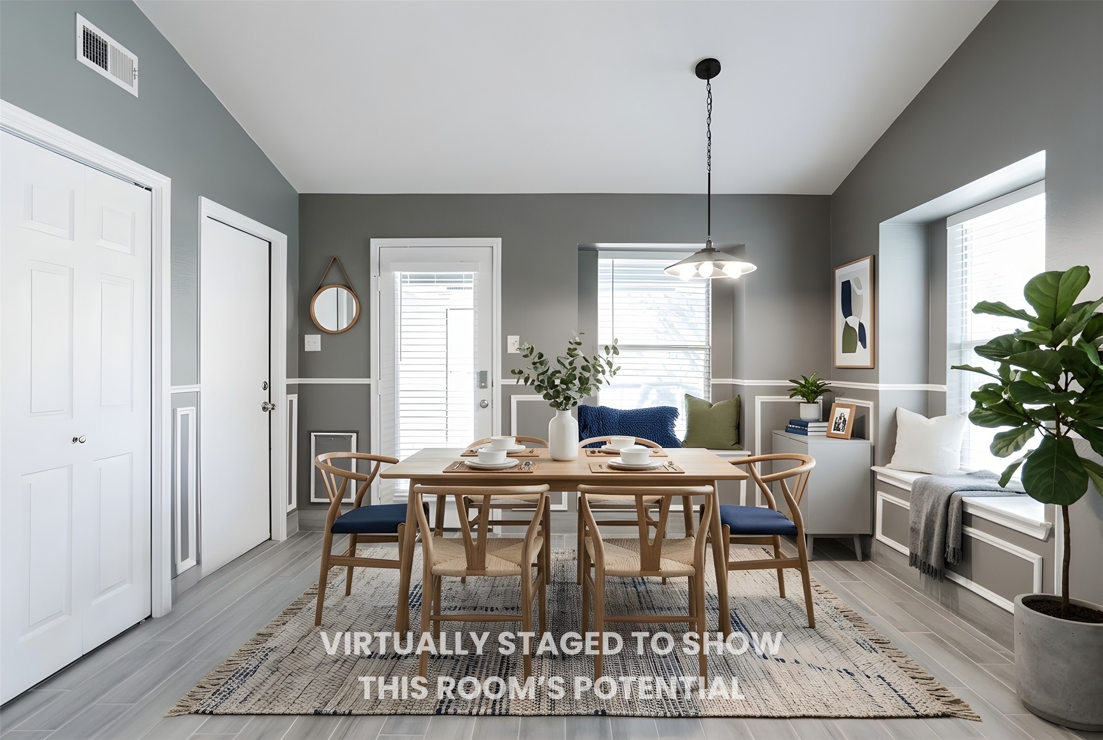 692 Scheel Kyle, TX 78640 - Photo 23 of 40 a view of a dining room with furniture window and wooden floor