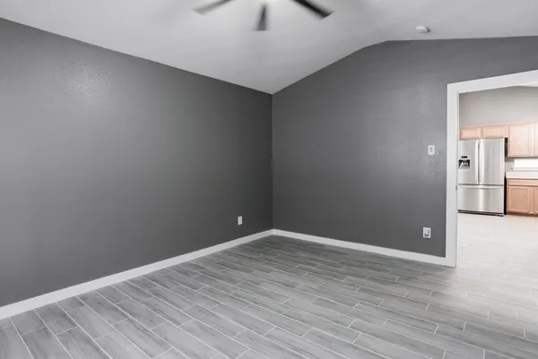 a bathroom with a double vanity sink and mirror