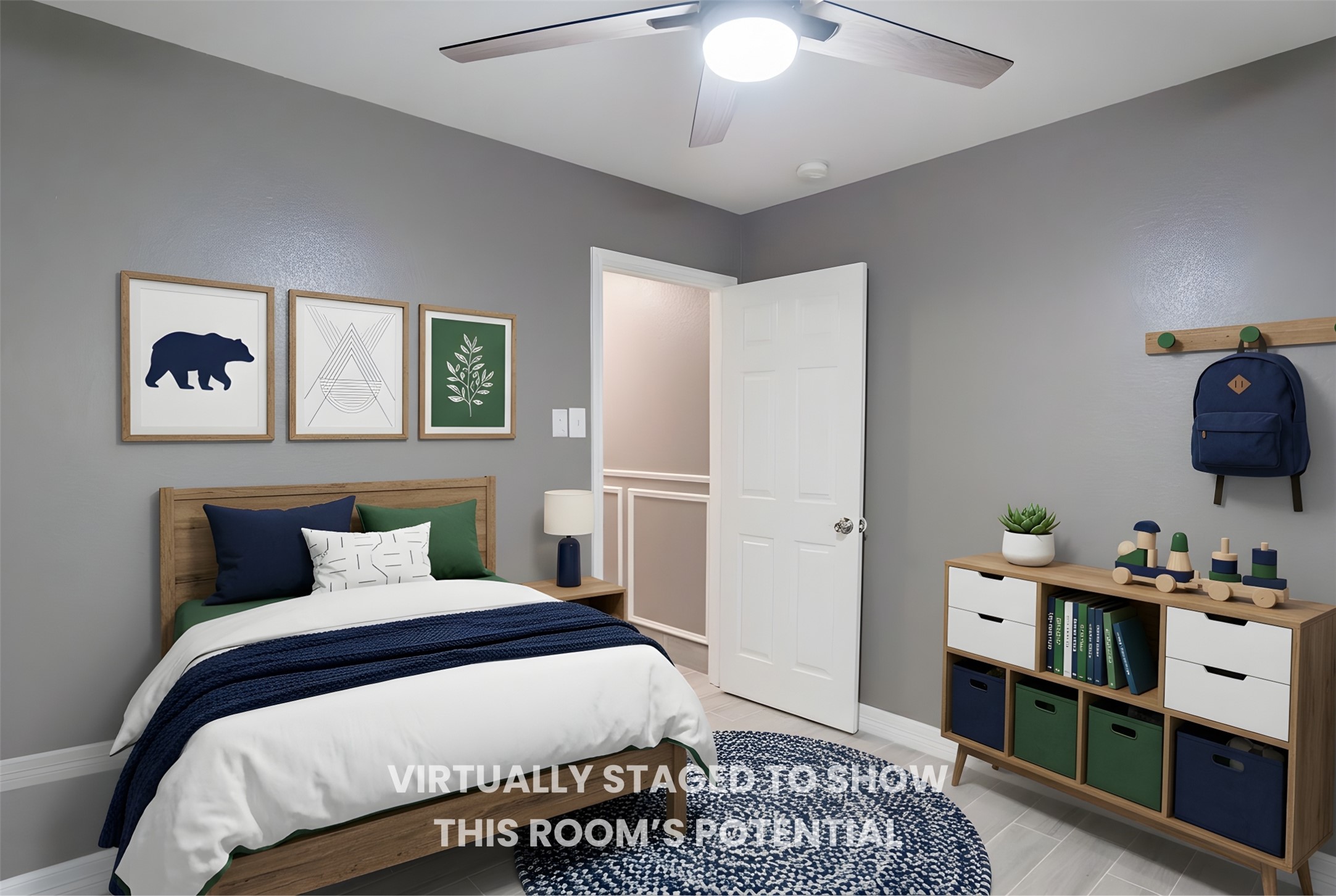 692 Scheel Kyle, TX 78640 - Photo 29 of 40 a bedroom with a bed and wooden floor