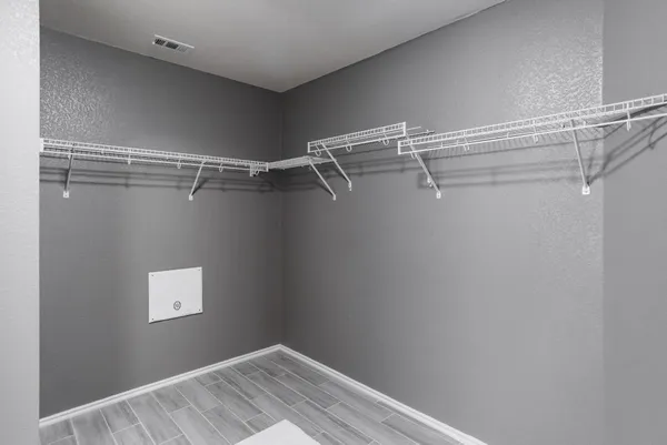 a view of a patio with wooden floor