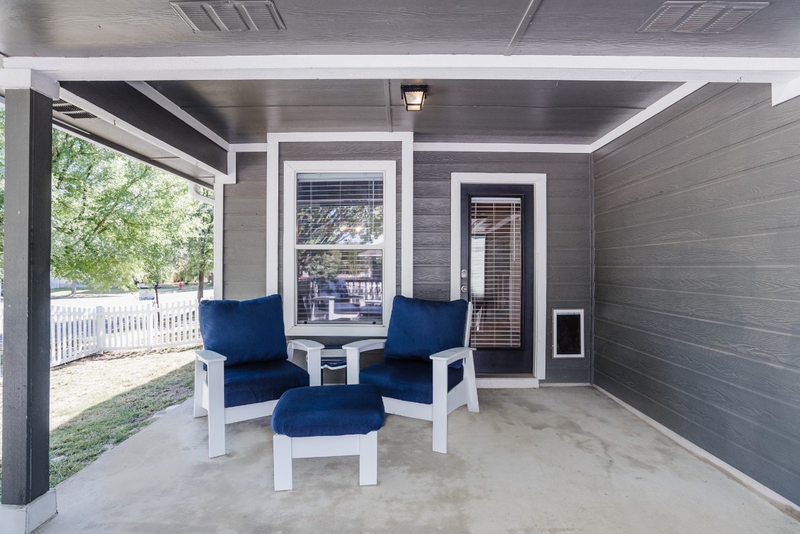 692 Scheel Kyle, TX 78640 - Photo 32 of 34 a living room with furniture and a large window
