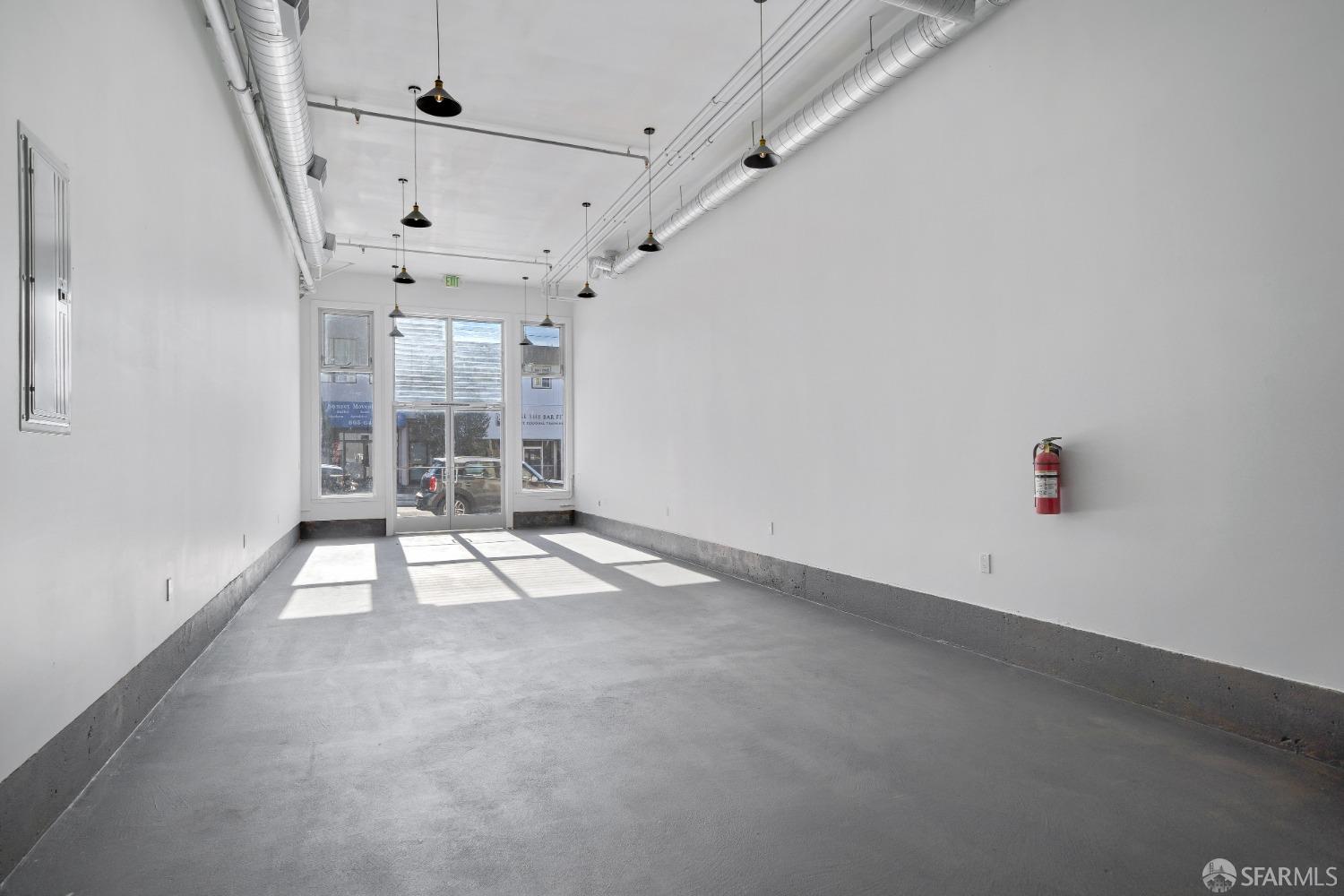 1644 Taraval Street San Francisco, CA 94116 - Photo 3 of 18 an empty room with windows