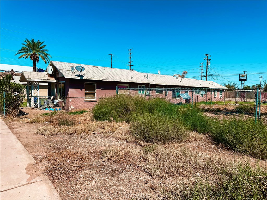 316 South Spring Street Blythe, CA 92225 - Photo 2 of 12 a view of a house with a yard