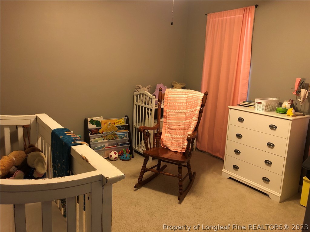 199 Falling Leaf Drive Raeford, NC 28376 - Photo 20 of 38 a view of a workspace with furniture