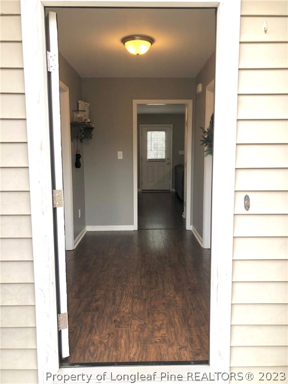 199 Falling Leaf Drive Raeford, NC 28376 - Photo 2 of 38 a view of a room with a hardwood and door