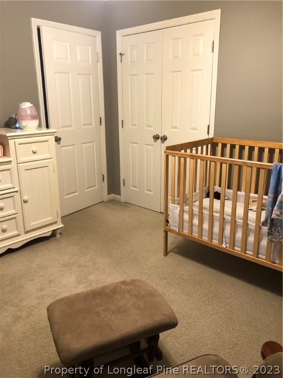 199 Falling Leaf Drive Raeford, NC 28376 - Photo 23 of 38 a view of a room with racks on the wall