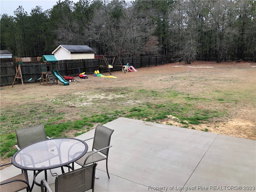 199 Falling Leaf Drive Raeford, NC 28376 - Photo 35 of 38 a view of outdoor space yard and patio