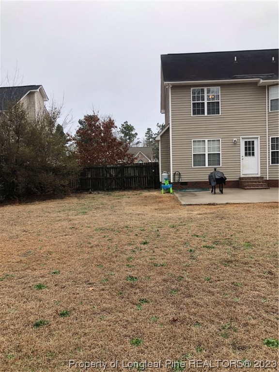 199 Falling Leaf Drive Raeford, NC 28376 - Photo 37 of 38 a view of a house with backyard