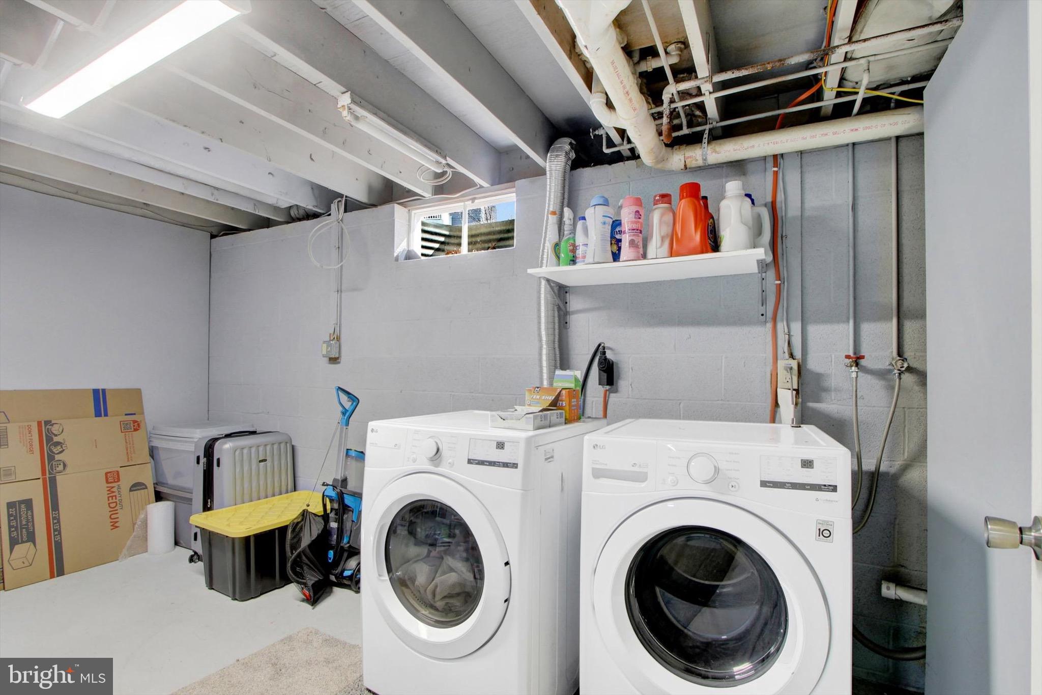 29 Meadowview Drive Hanover, PA 17331 - Photo 14 of 18 a view of a storage & utility room with dryer and washer