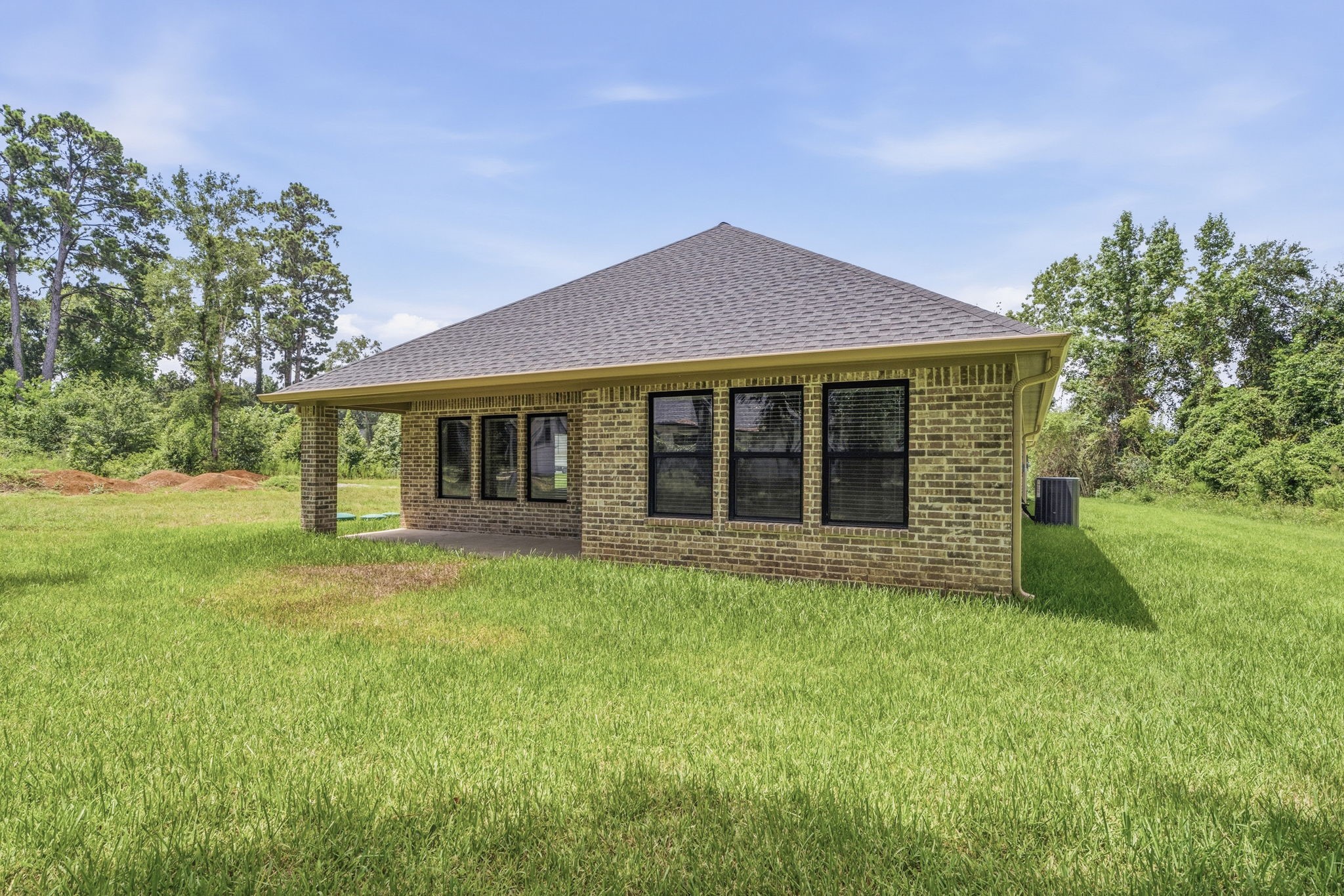 23620 Youpon Lane Spring, TX 77389 - Photo 33 of 37 This sturdy home features a timeless facade that provides excellent insulation and structural integrity.