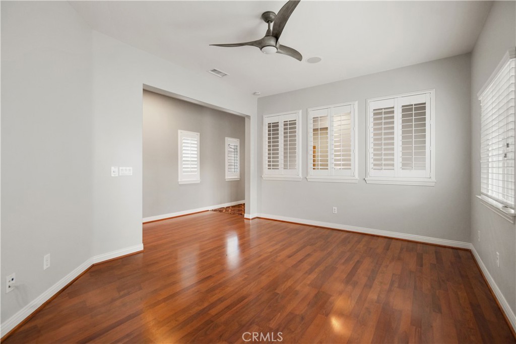 1 Bower Lane Ladera Ranch, CA 92694 - Photo 28 of 40 a view of an empty room with wooden floor and a window
