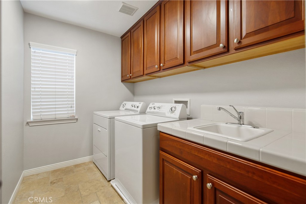 1 Bower Lane Ladera Ranch, CA 92694 - Photo 31 of 40 a utility room with dryer and washer