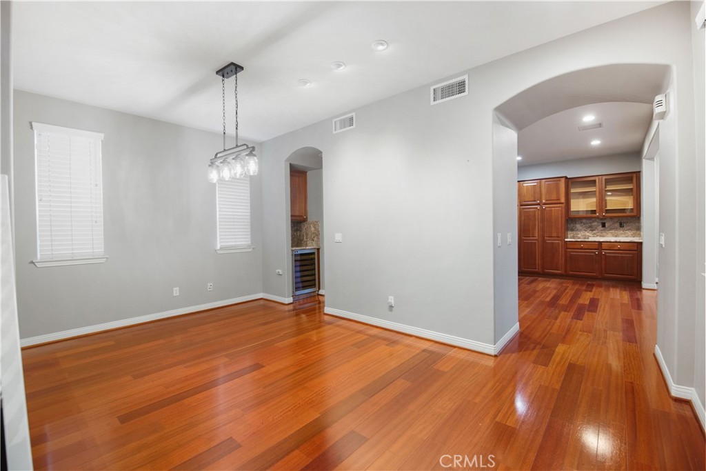 1 Bower Lane Ladera Ranch, CA 92694 - Photo 7 of 40 a view of empty room with wooden floor
