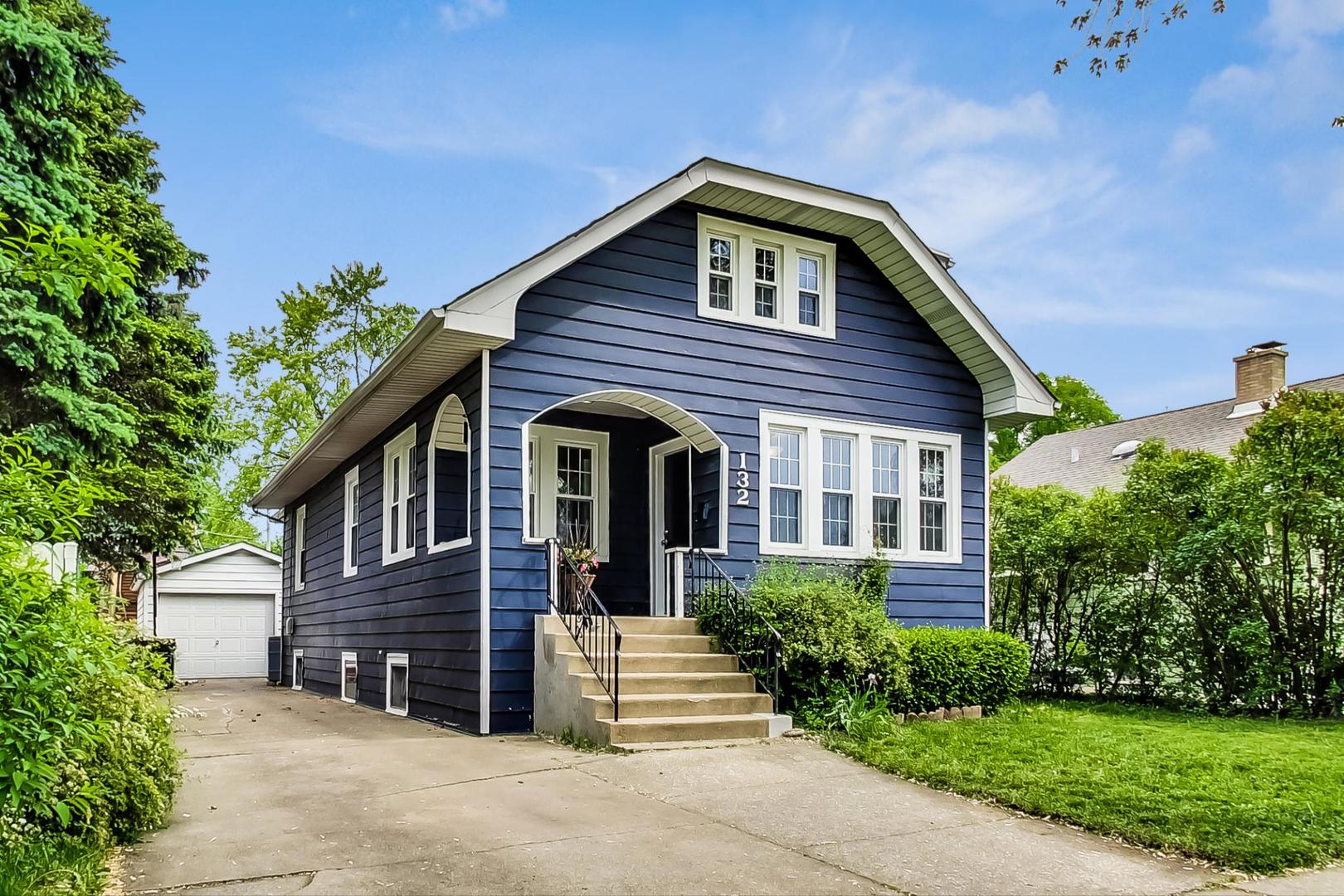 132 East Burlington Street Riverside, IL 60546 - Photo 1 of 38 a front view of a house with a yard