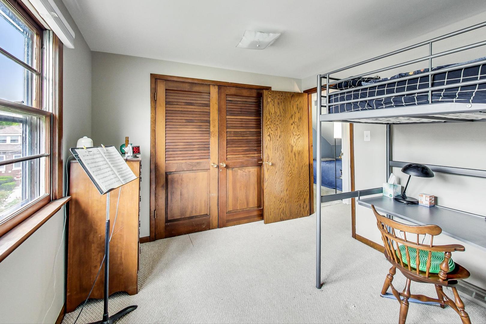 132 East Burlington Street Riverside, IL 60546 - Photo 24 of 38 a view of a livingroom with furniture and a window