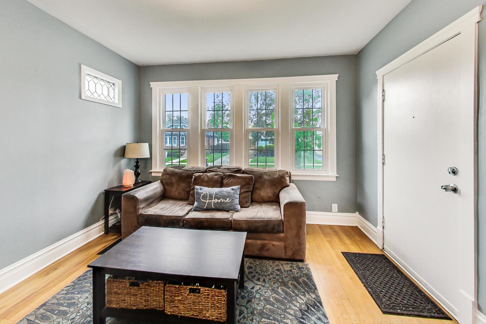 132 East Burlington Street Riverside, IL 60546 - Photo 5 of 38 a living room with furniture and a window