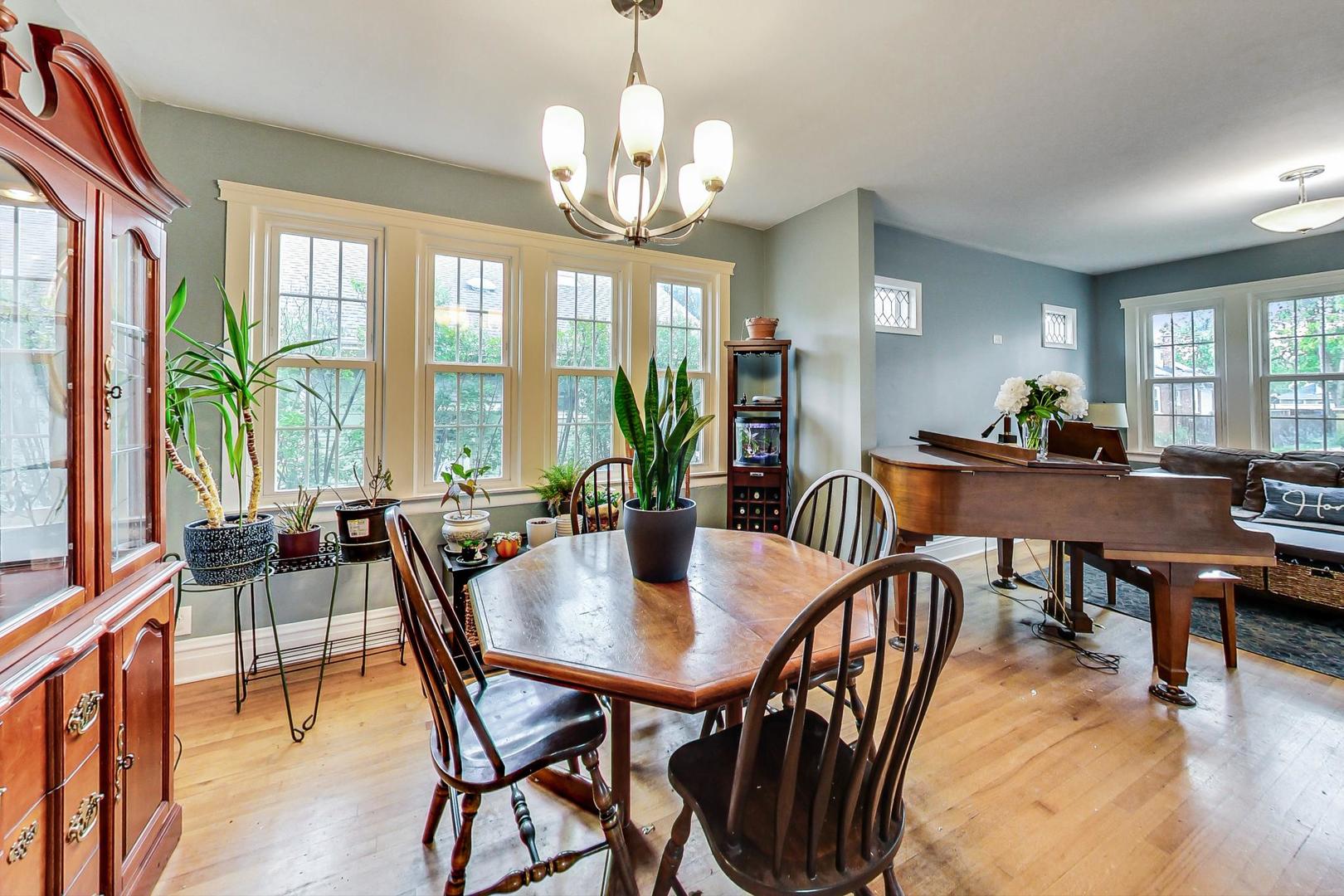 132 East Burlington Street Riverside, IL 60546 - Photo 8 of 38 a view of a dining room with furniture window and outside view