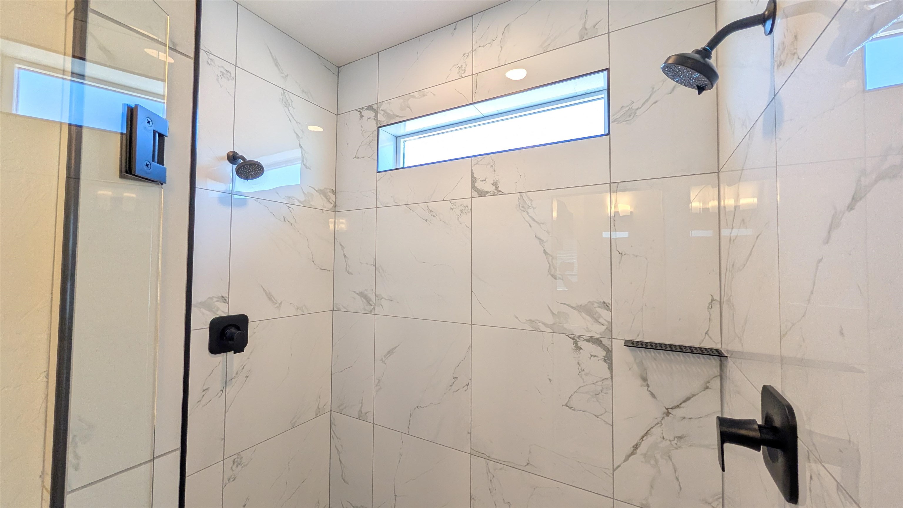 1660 Rusty Rivet Road Fruita, CO 81521 - Photo 11 of 15 a bathroom with a shower