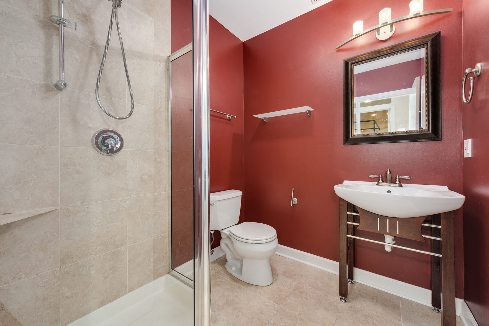 1718 West Huron Street Chicago, IL 60622 - Photo 27 of 33 a bathroom with a sink mirror and toilet