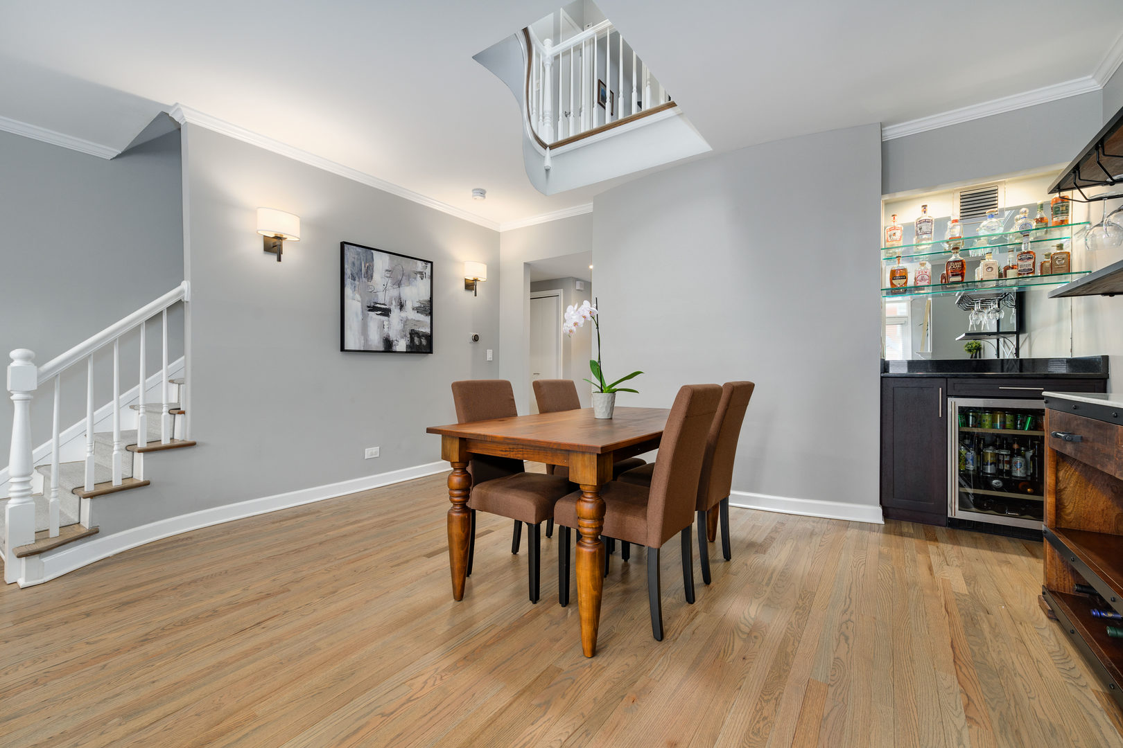 1718 West Huron Street Chicago, IL 60622 - Photo 7 of 33 a view of a dining room with furniture and wooden floor