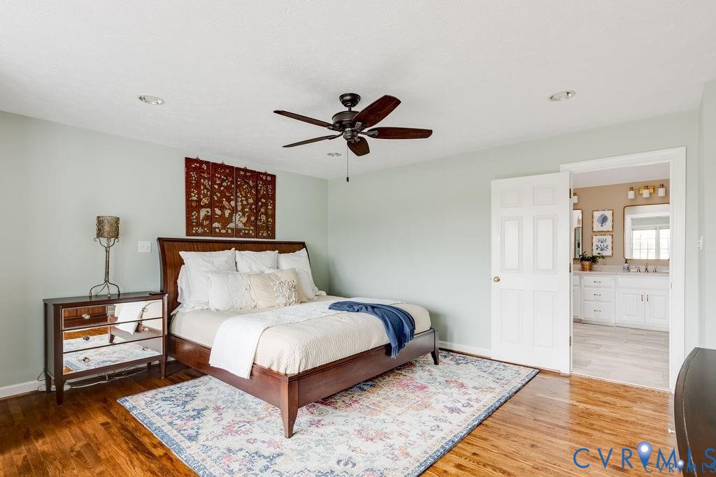 4040 Richmond Road Amelia Court House, VA 23002 - Photo 21 of 50 a bedroom with a bed lamp and a rug