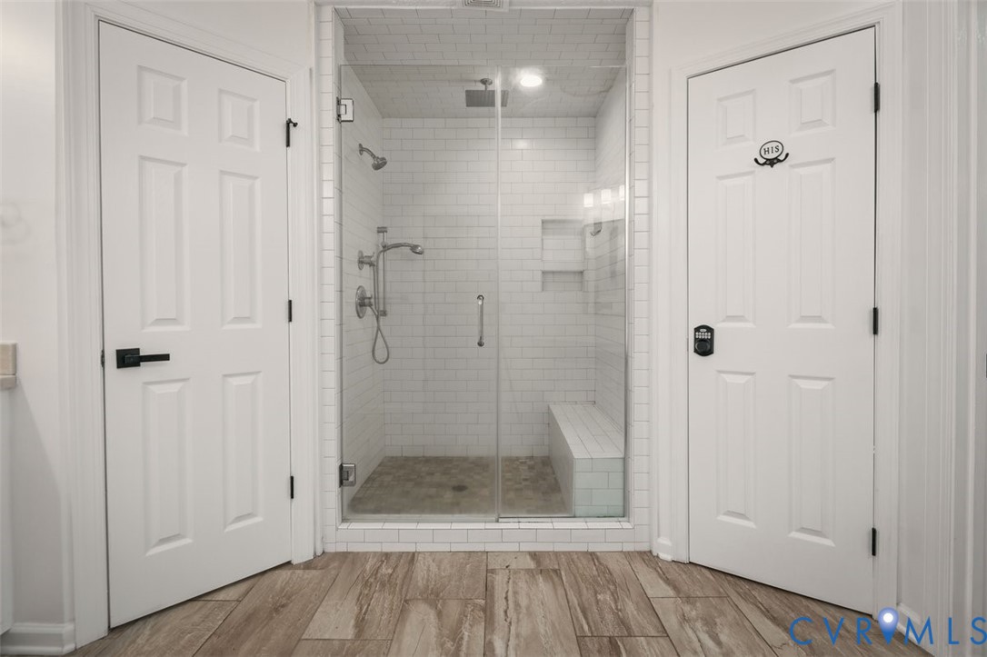 4040 Richmond Road Amelia Court House, VA 23002 - Photo 23 of 50 a bathroom with a glass shower door