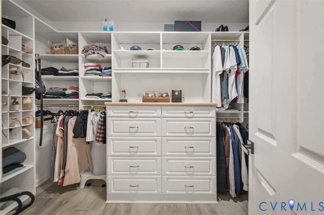 4040 Richmond Road Amelia Court House, VA 23002 - Photo 24 of 50 a view of walk in closet with clothes and shoes