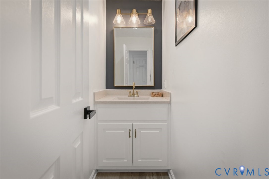 4040 Richmond Road Amelia Court House, VA 23002 - Photo 25 of 50 a bathroom with a sink and a mirror