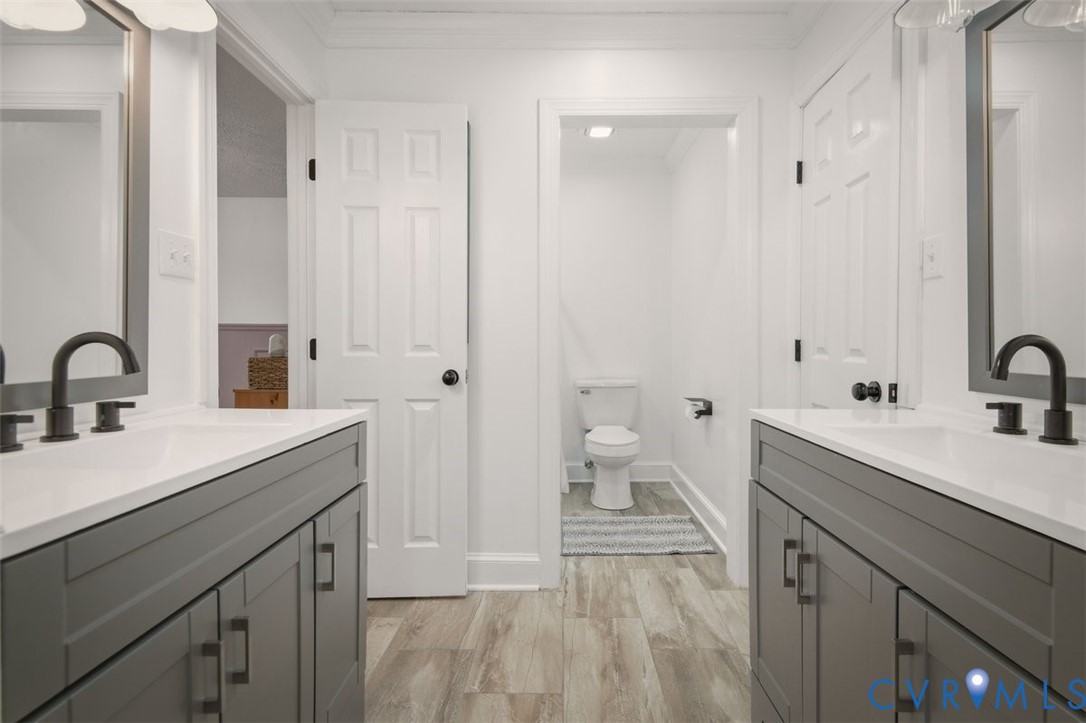 4040 Richmond Road Amelia Court House, VA 23002 - Photo 29 of 50 a spacious bathroom with a sink double vanity and a mirror