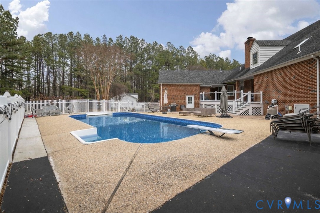 4040 Richmond Road Amelia Court House, VA 23002 - Photo 3 of 50 a view of a house with swimming pool and sitting area