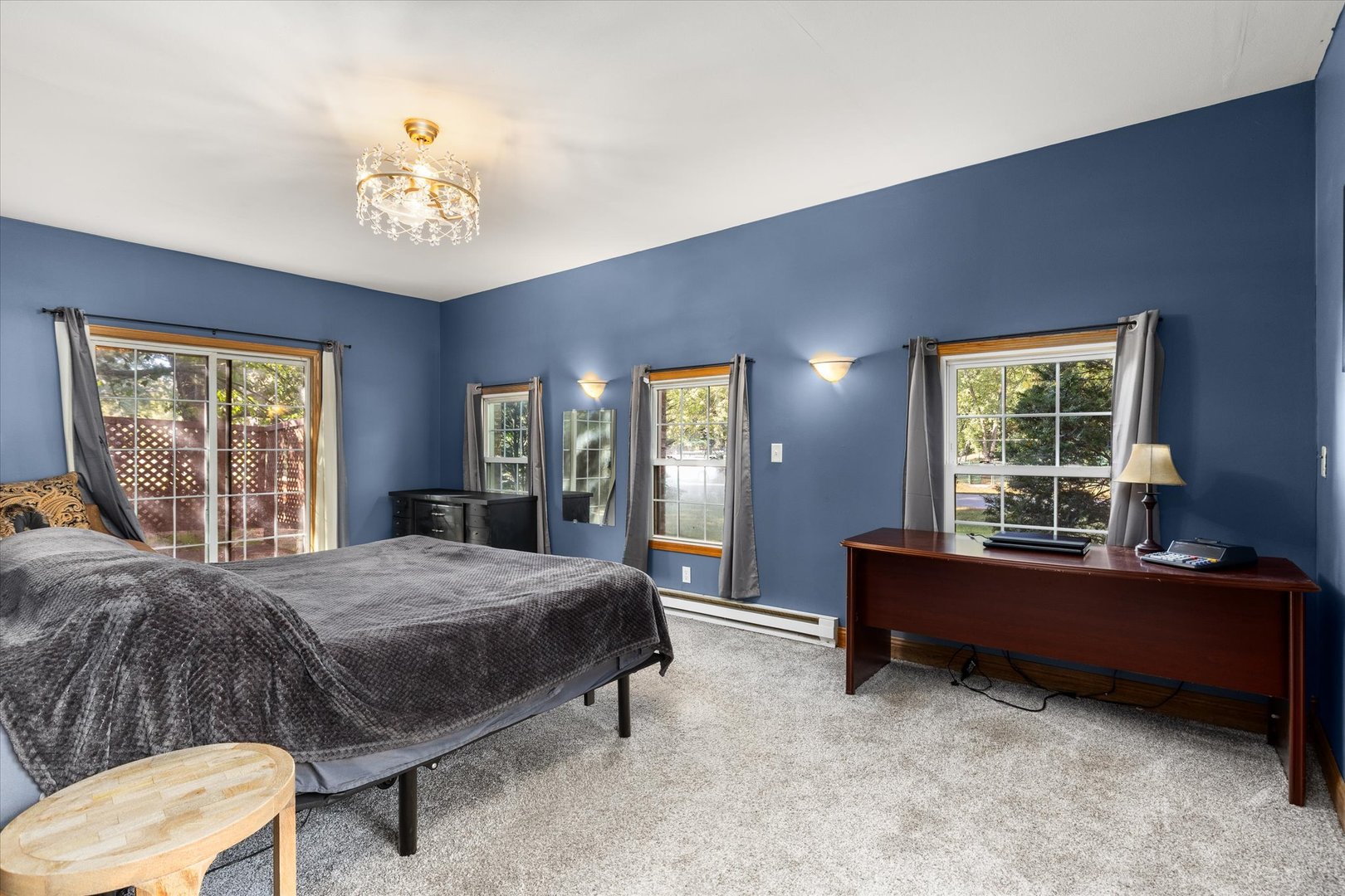 3440 Cardinal Lane Morris, IL 60450 - Photo 16 of 34 a spacious bedroom with a bed and window