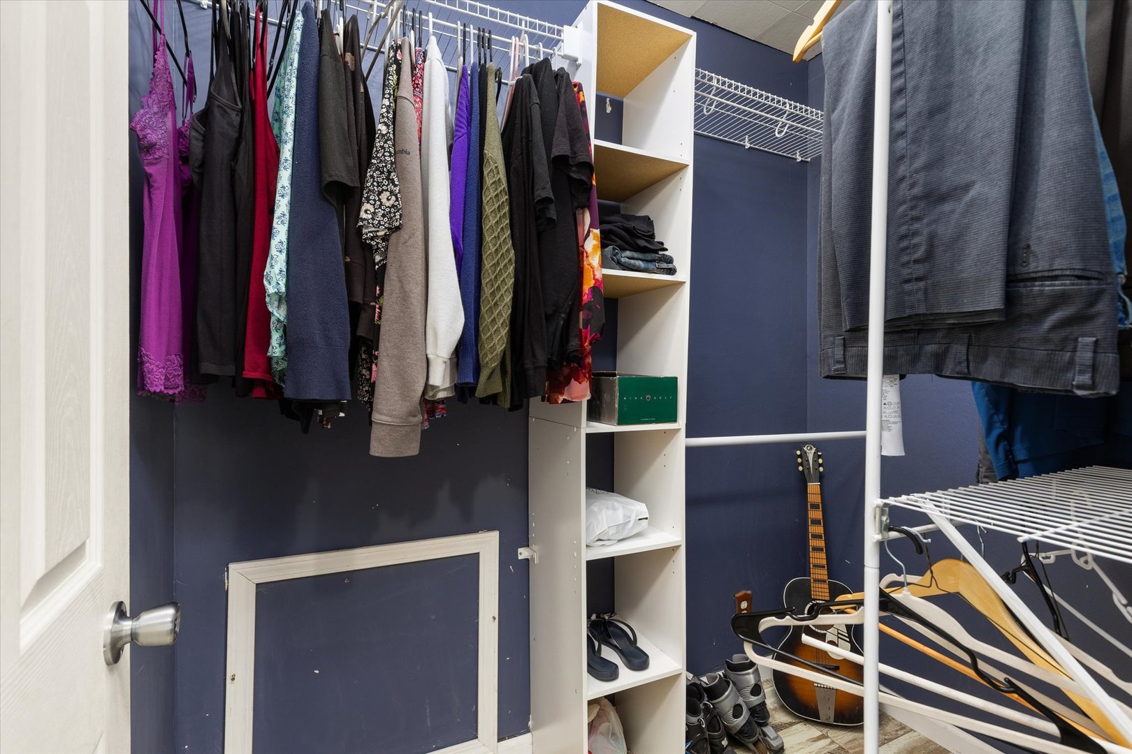 3440 Cardinal Lane Morris, IL 60450 - Photo 18 of 34 a view of walk in closet with clothes and shoes
