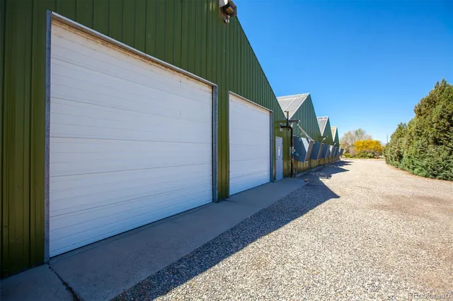 a view of a house with a road