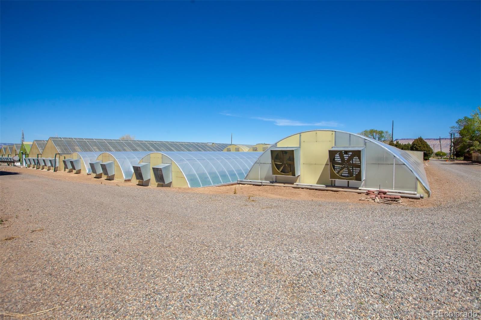 3281 C Road Palisade, CO 81526 - Photo 23 of 33 a view of a house with a road