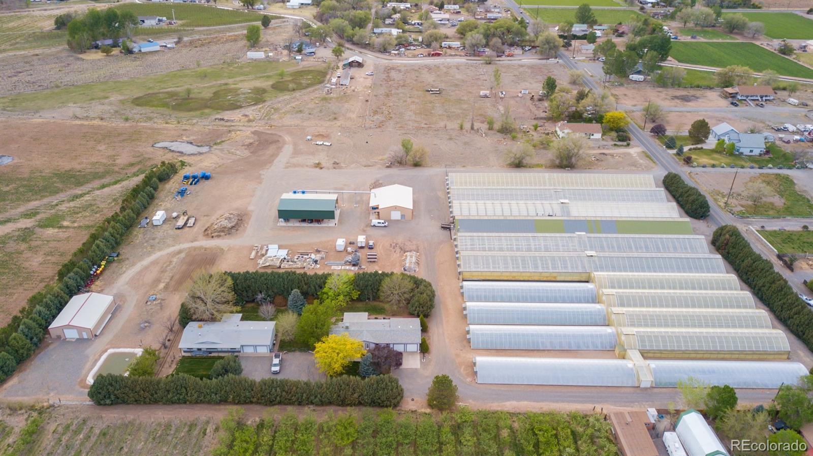 3281 C Road Palisade, CO 81526 - Photo 3 of 33 a view of building and yard