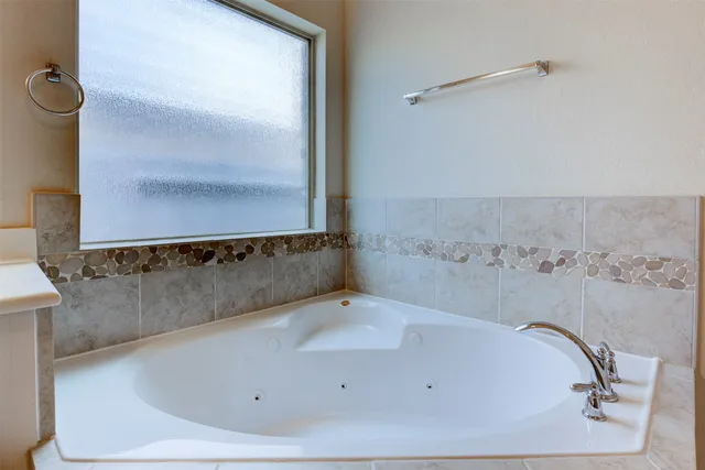 a bathroom with a bathtub