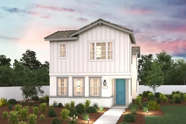 front view of a house with a yard