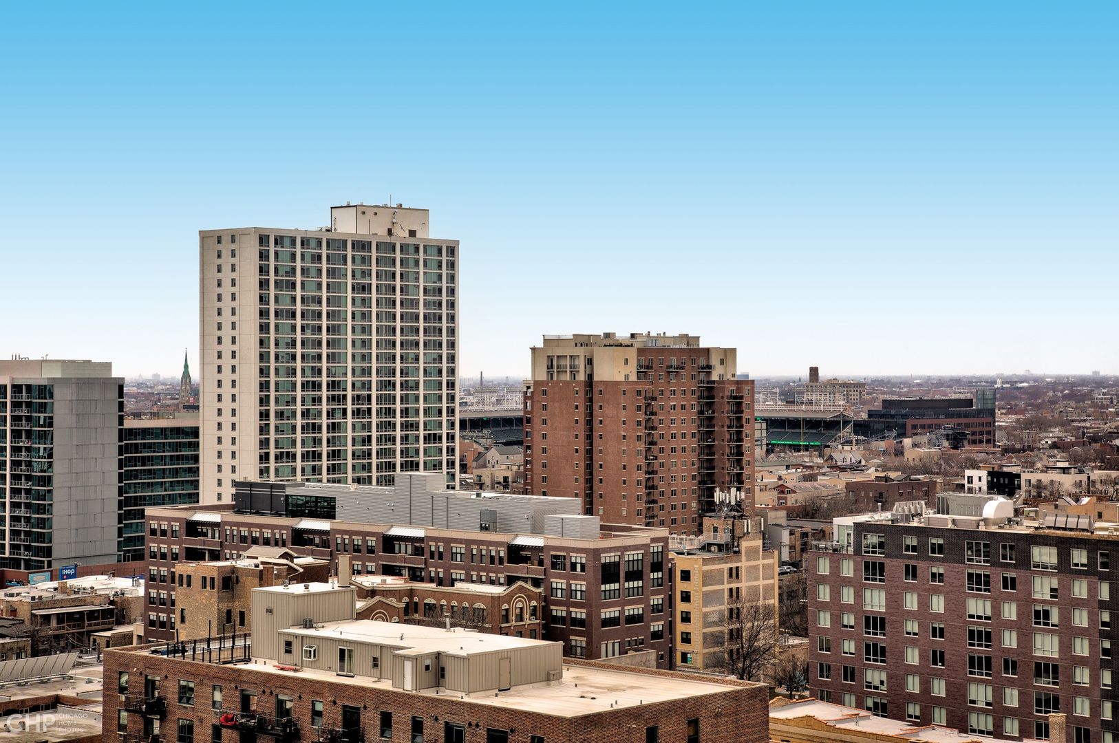 655 West Irving Park Road, Unit 1703 Chicago, IL 60613 - Photo 13 of 15 a view of city with tall buildings