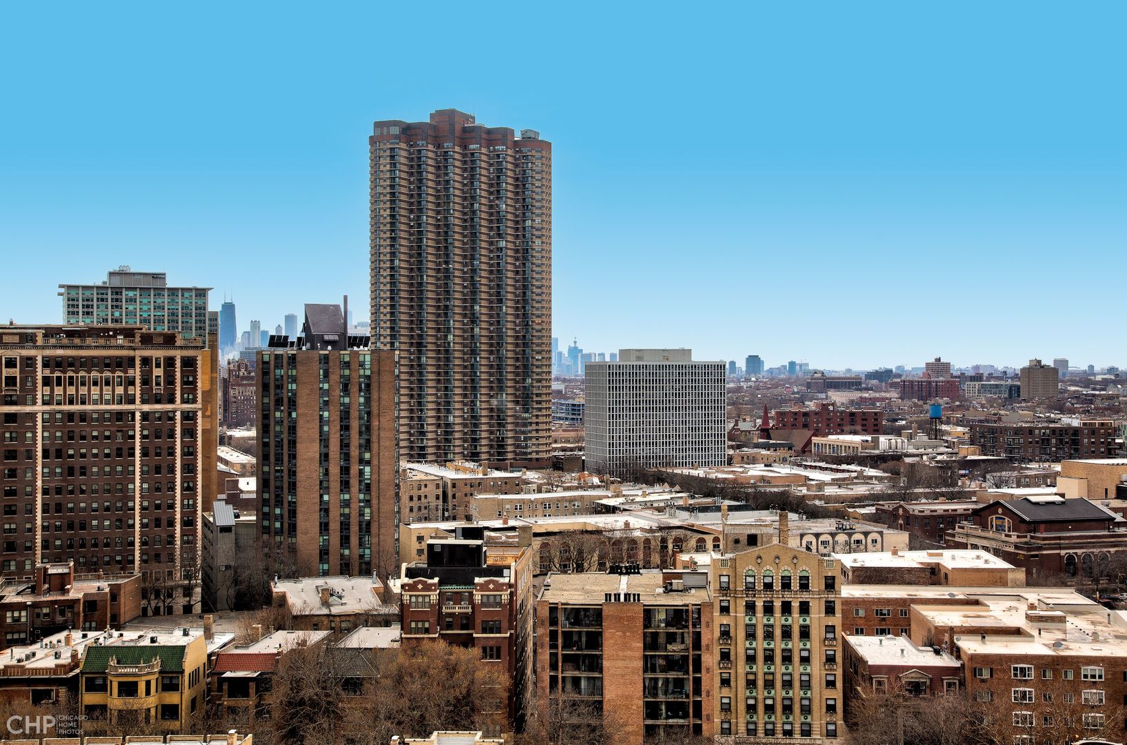 655 West Irving Park Road, Unit 1703 Chicago, IL 60613 - Photo 14 of 15 a city view with tall buildings