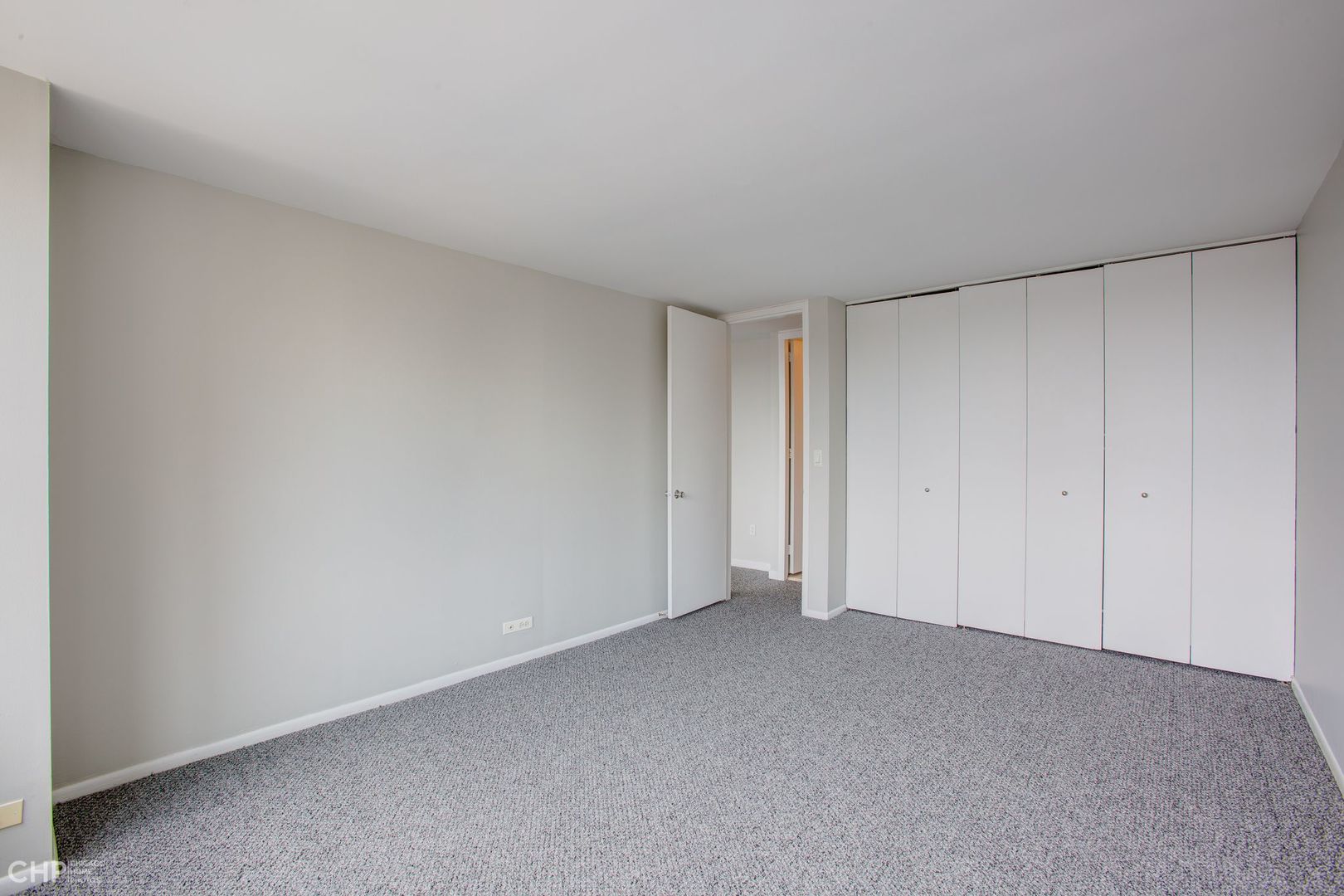 655 West Irving Park Road, Unit 1703 Chicago, IL 60613 - Photo 8 of 15 a view of an empty room and entryway